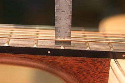 how to lower the action on acoustic guitar