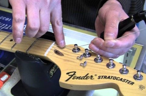 how to restring an electric guitar